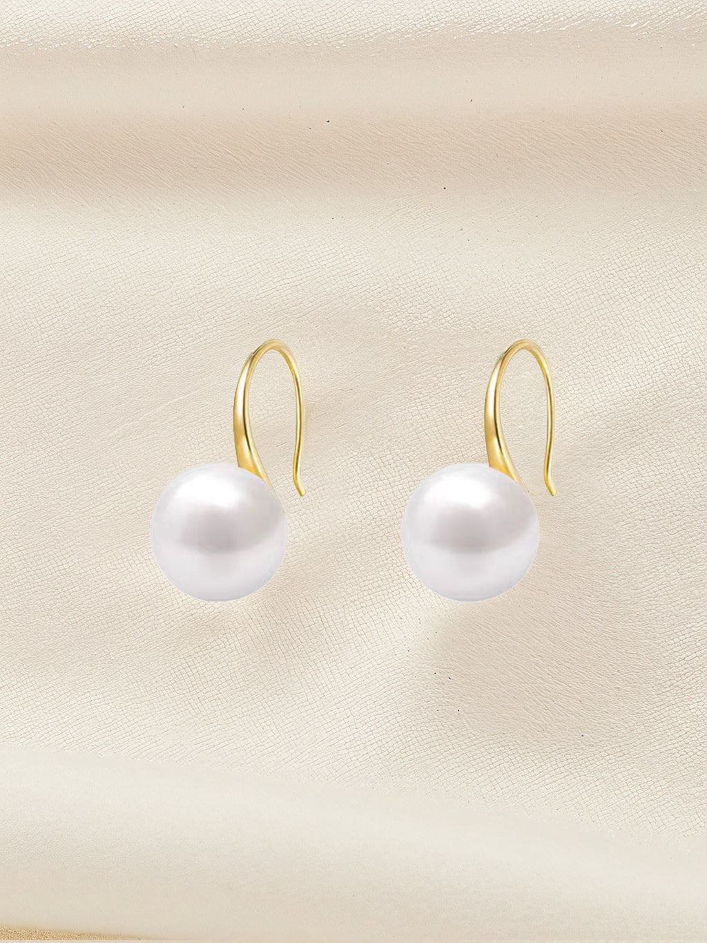 Pendientes de perlas doradas