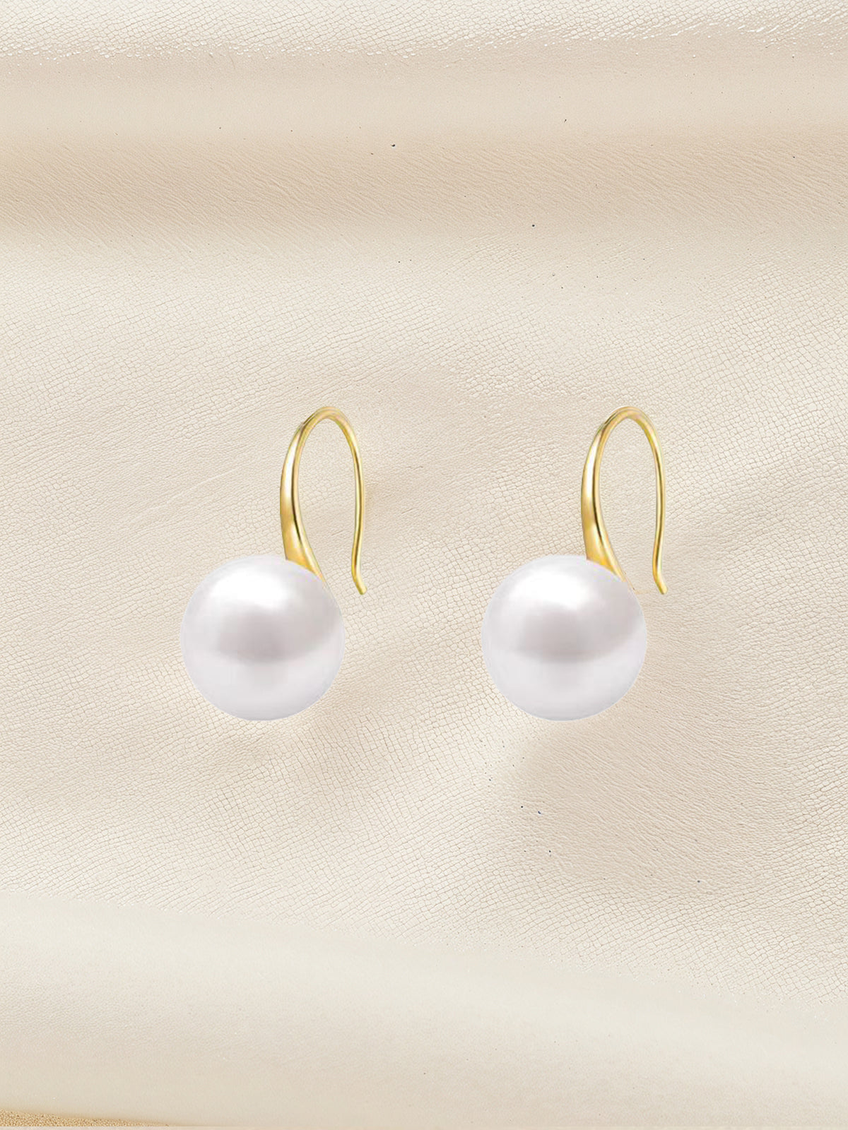 Pendientes de perlas doradas