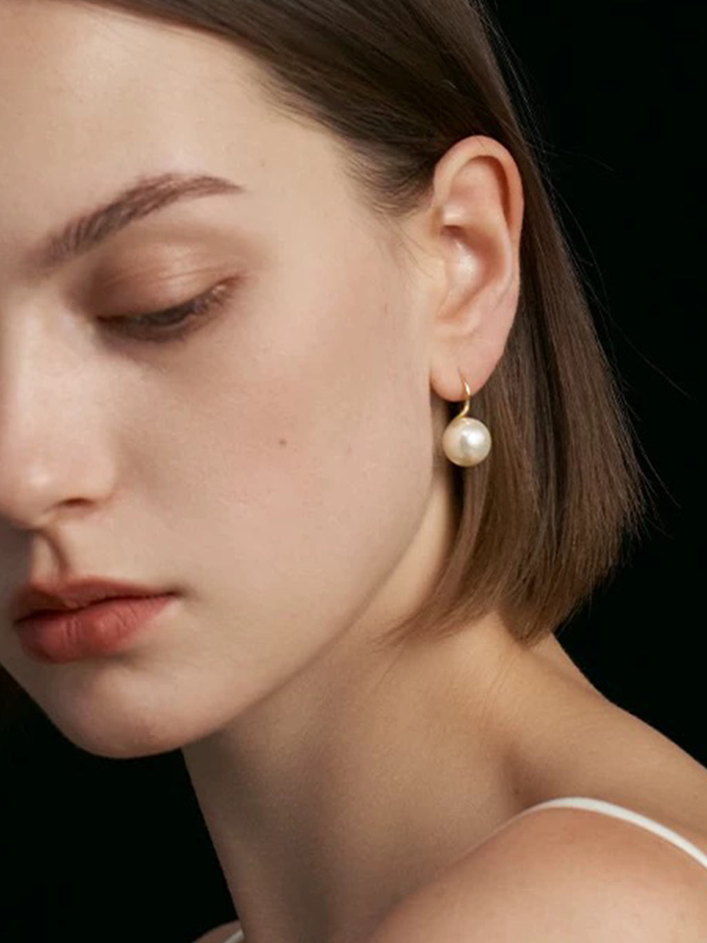 Pendientes de perlas doradas