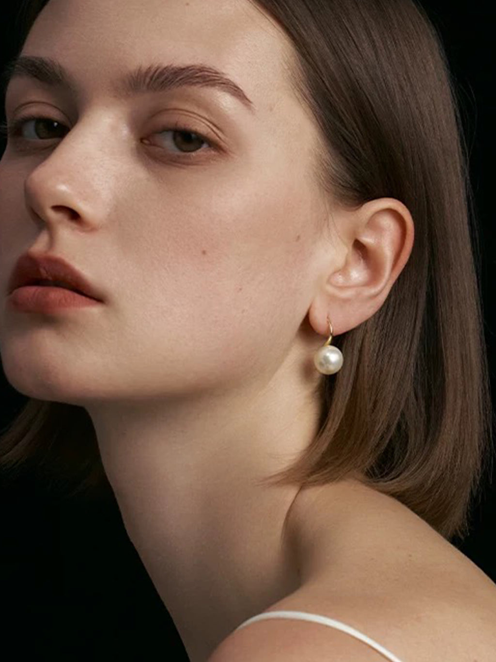 Pendientes de perlas doradas